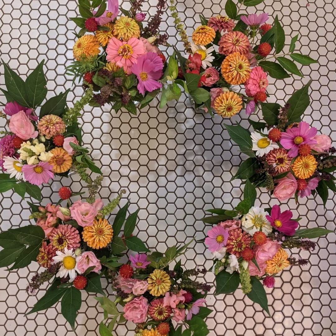 Bouquets of flowers arranged in a circle.