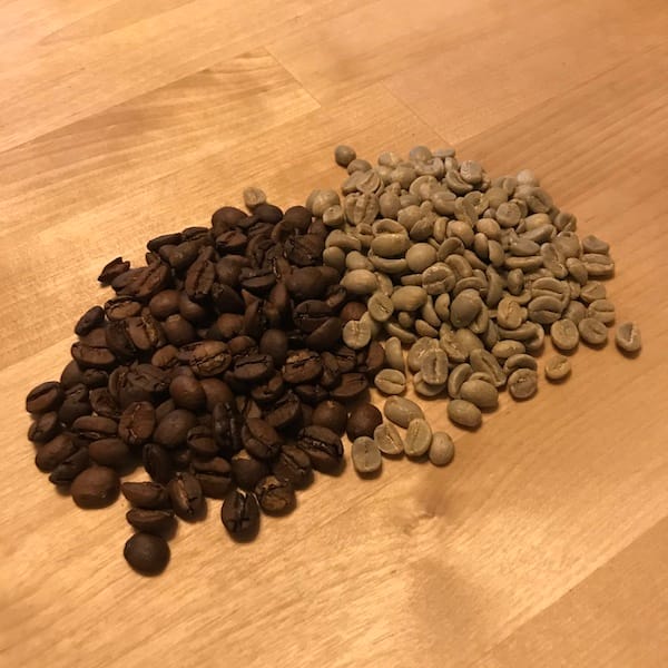 Green and roasted coffee beans.